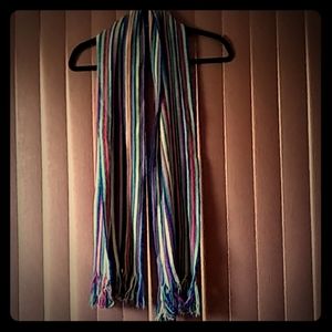 Adorable multi colored striped scarf.